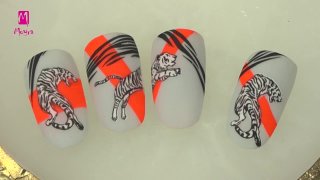 Stylish, matte nail art with tiger motif - Preview