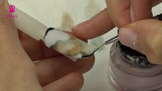 Marble aquarelle nail art in rustic golden frame