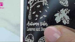 Colourful sticker nail art inspired by autumn