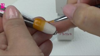 Stamping and sticker nail art on ombre base