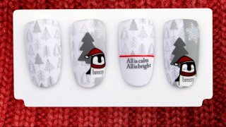 Winter nail art with cute penguin and pine trees