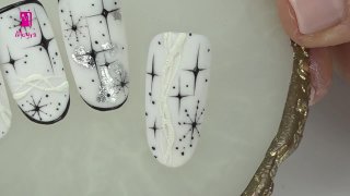 Hand-painted nail art with stars and snowflakes - Preview