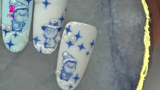 Cheerful winter nail art with snowman and penguin - Preview