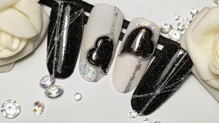 Elegant, hand-painted nail art with effect powders