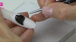 Elegant, hand-painted nail art with effect powders