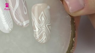 Tricky, white stamping nail art - Preview