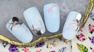 Spring nail art with magnolia sticker and stamping
