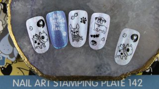 Charming manicure with dog stamping patterns
