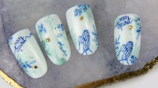 Stamping nail art for Pentecost on glittering base