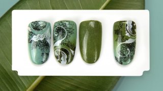 Dahlia nail art on a gradient green acrylic base