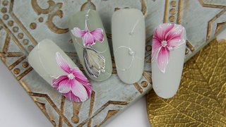 Aquarelle floral nail art with beads