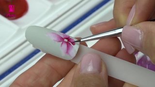 Aquarelle floral nail art with beads