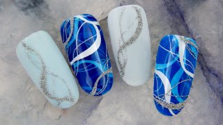 Stamping nail art in blue shades