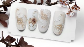 Ecru-coloured nail art with lace motif for wedding