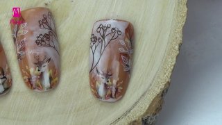 Deer nail art with autumn colours and patterns - Preview