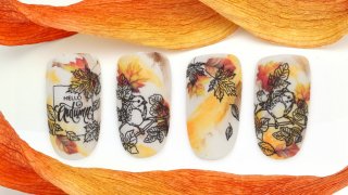 Birdie nail art with warm orange shades