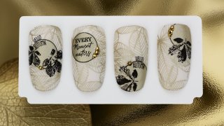 Golden stamping nail art with autumn leaves