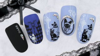 Charming cat nail art with crystal stones