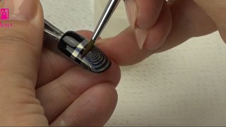 3D-like nail art created with stamping