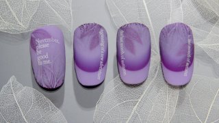 Extremely flashy purple stamping and sticker nails