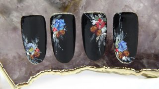 Sticker nail art with hand-painted details