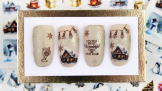 Snow covered cottage with festive stamping pattern