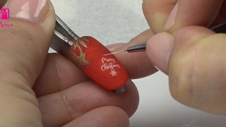 Wonderful Christmas nail art with layered stamping