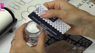 Butterfly nail art with lace motif