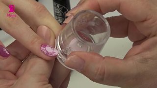 Stamping nail art in charming pink shades