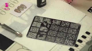 Stamping nail art made on colorful acrylic base