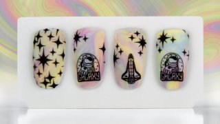 Cheerful nail art inspired by a space trip