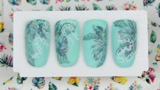 Sticker and stamping nail art in summer atmosphere