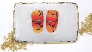 Ombre nails with nail art sticker, beads, tendrils