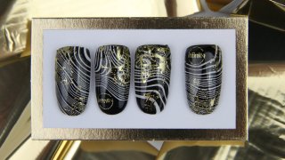 Flashy nails with gold effected stamping pattern