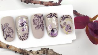 Floral nail art prepared with layer stamping