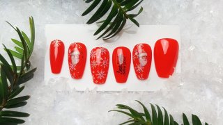 Santa sticker nail art with snowflakes, glitters