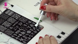 Holly branch nail art in green shades