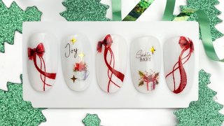Glittering Christmas bow manicure idea