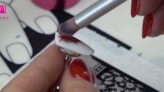 Glittering Christmas bow manicure idea