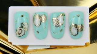 Elegant fruity nail art in turquoise-gold shades