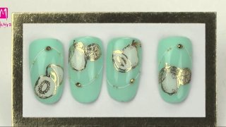 Elegant fruity nail art in turquoise-gold shades