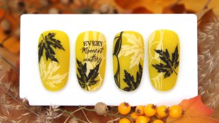 Autumn leaf nail art with inscription